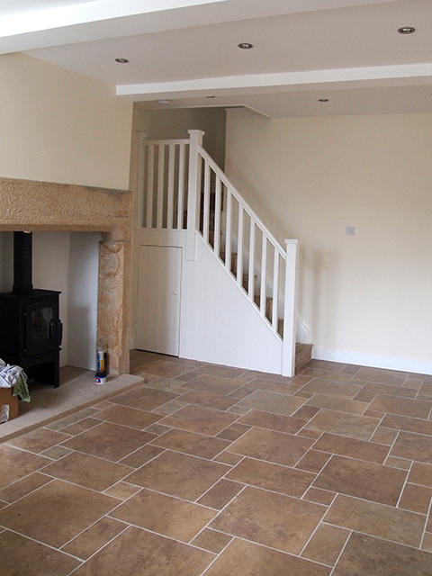 custom fireplace with stairs and handrail
